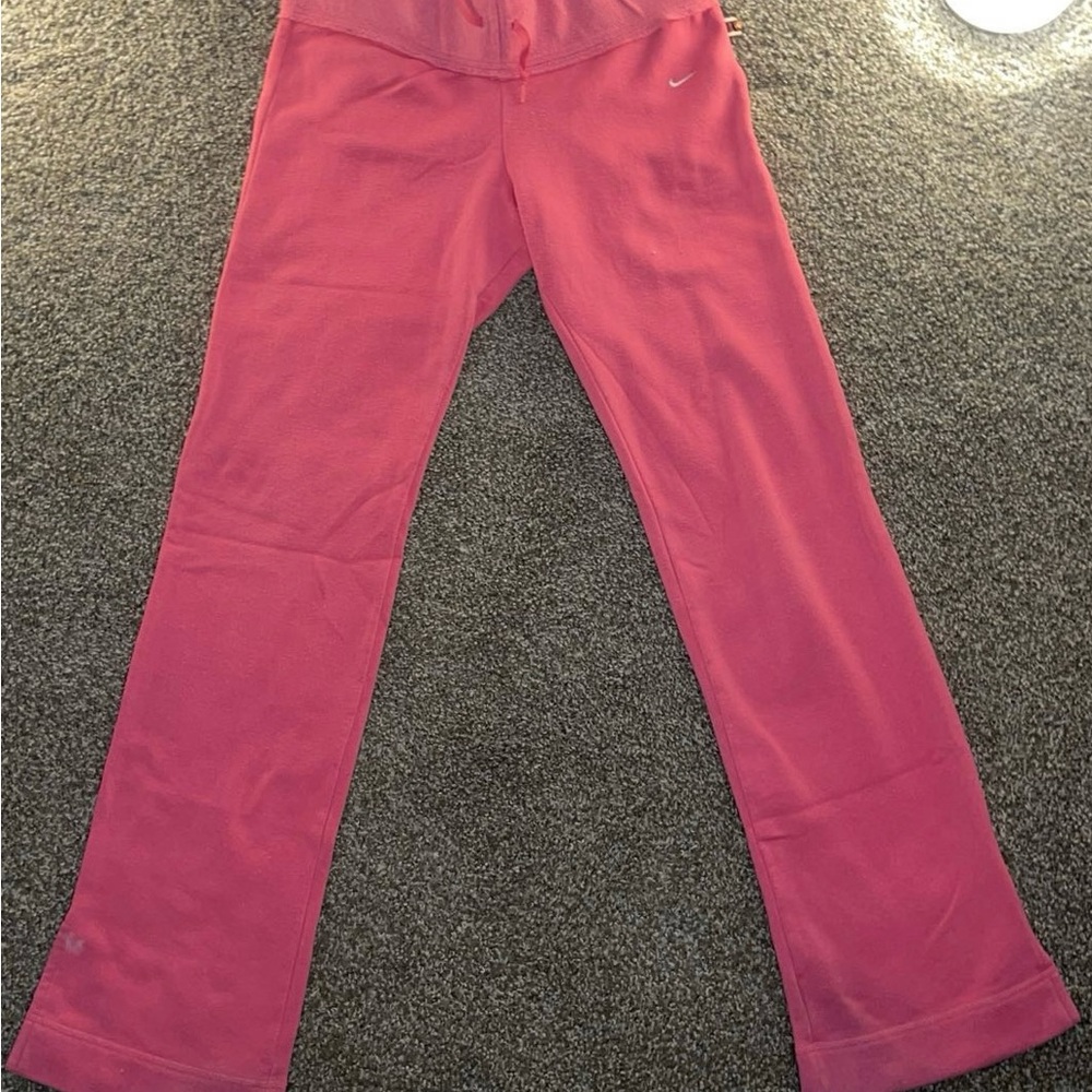 Woman’s NIKE pink flare track suit bottoms